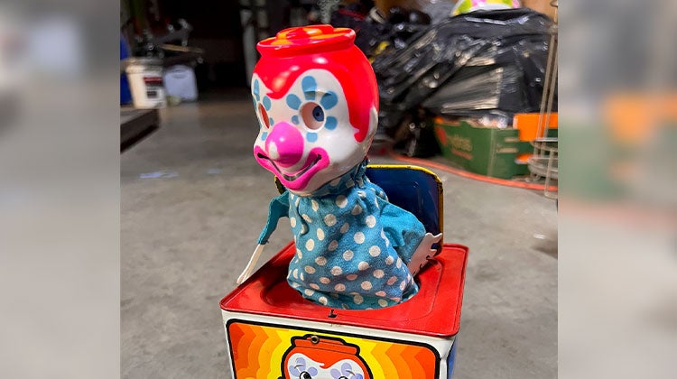 Jack-in-the-box clown with polka dot clothing Jack-in-the-box clown with polka dot clothing