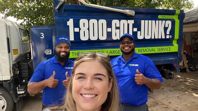 Furniture Dr in blog image Selfie of Lilly Skjoldahl from The Furniture Dr and two members of the 1-800-GOT-JUNK? team smiling at the camera