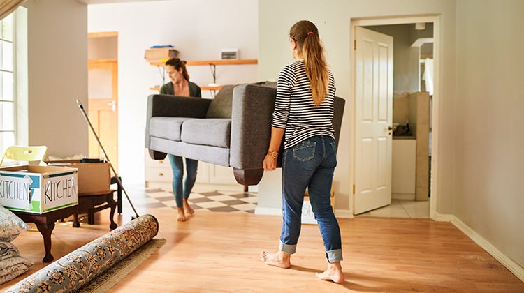 Get rid of old couch 1 Mom and daughter carrying an old couch to get rid of it
