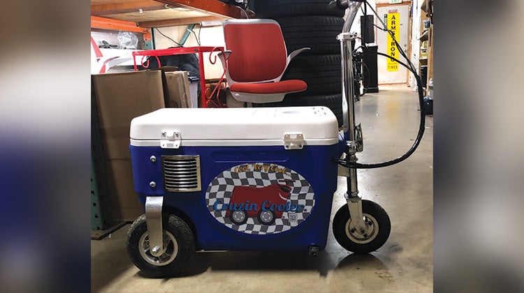 Weird Junk 2024 Cruisin Cooler A cooler with wheels, handlebar and breaks