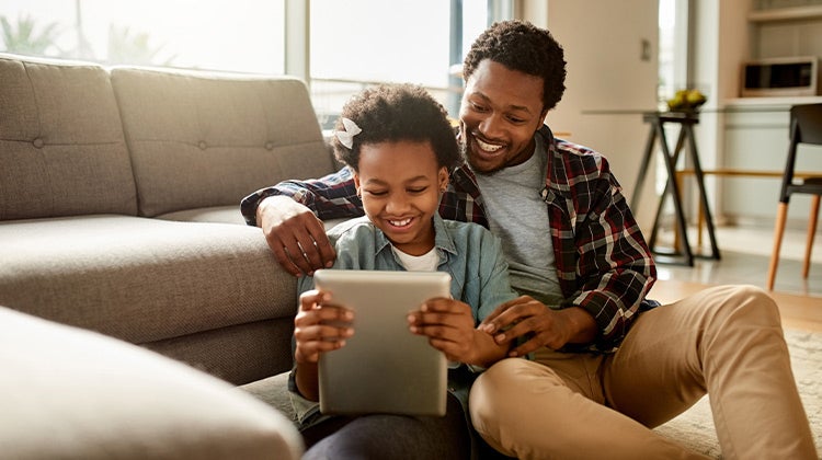 Father reading with his child Father reading with his child