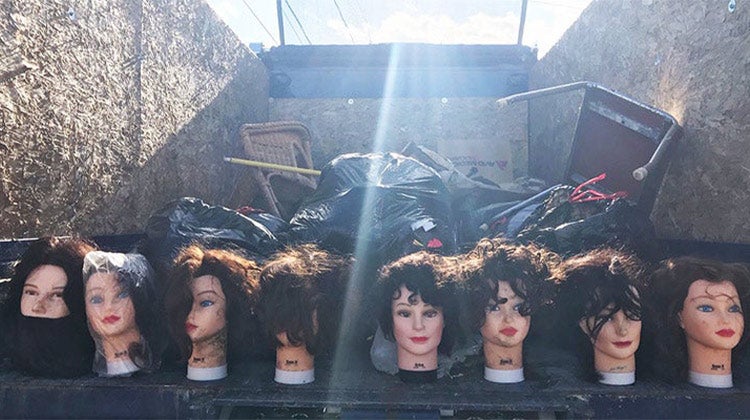 Mannequin heads in a 1-800-GOT-JUNK? truck Mannequin heads in a 1-800-GOT-JUNK? truck