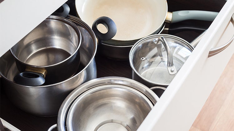 Pots and pans organized in a drawer Pots and pans organized in a drawer
