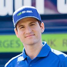Headshot of TOM with 1-800-GOT-JUNK? hat and uniform Headshot of TOM with 1-800-GOT-JUNK? hat and uniform