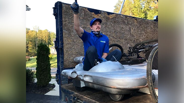 Truck Team Member in a toy spaceship Truck Team Member in a toy spaceship